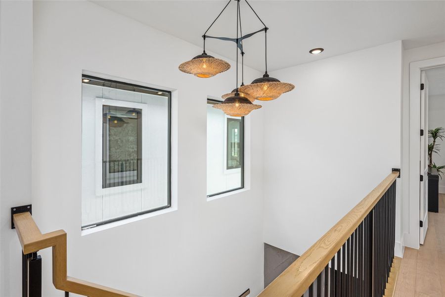 An awe-inspiring foyer chandelier sets the ambiance from the moment you step inside