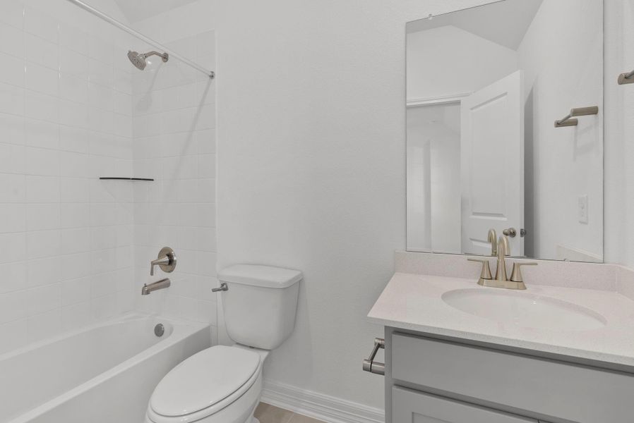 Furnished interior view inside a new home in Westland Ranch, League City (Image 3).