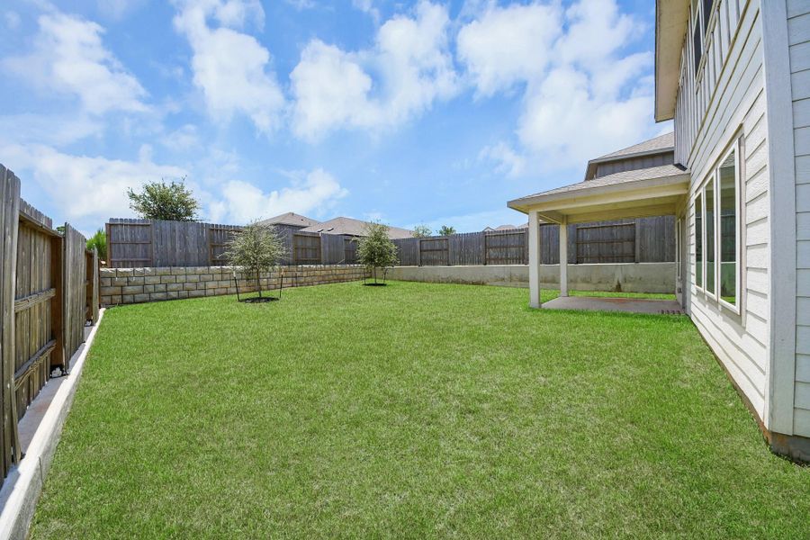 Exterior details and patio area of a home in Montgomery Oaks - Premier, Conroe (Image 4). Exterior details and patio area of a home in Montgomery Oaks - Premier, Conroe (Image 4).