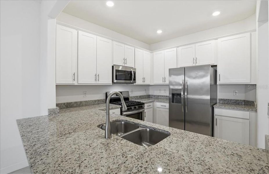 Furnished interior view inside a new home in , Lakewood Ranch (Image 9). Furnished interior view inside a new home in , Lakewood Ranch (Image 9).