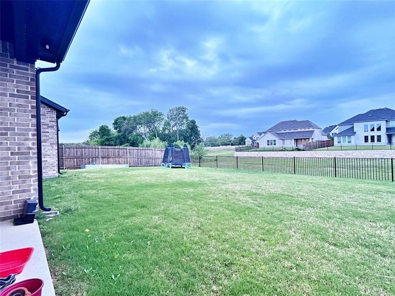 Exterior details and patio area of a home in Northlake Estates 65s, Little Elm (Image 4).