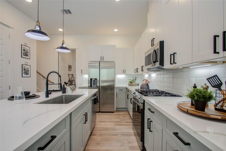 MOVE-IN READY!  Photos from another community by the same builder, FINISHES & FLOOR PLAN WILL VARY! Ceiling fans are not included!