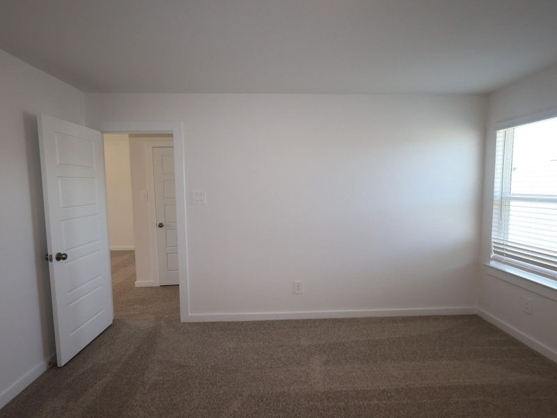 Spacious, unfurnished interior of a new home in Pinewood at Grand Texas, New Caney (Image 10).