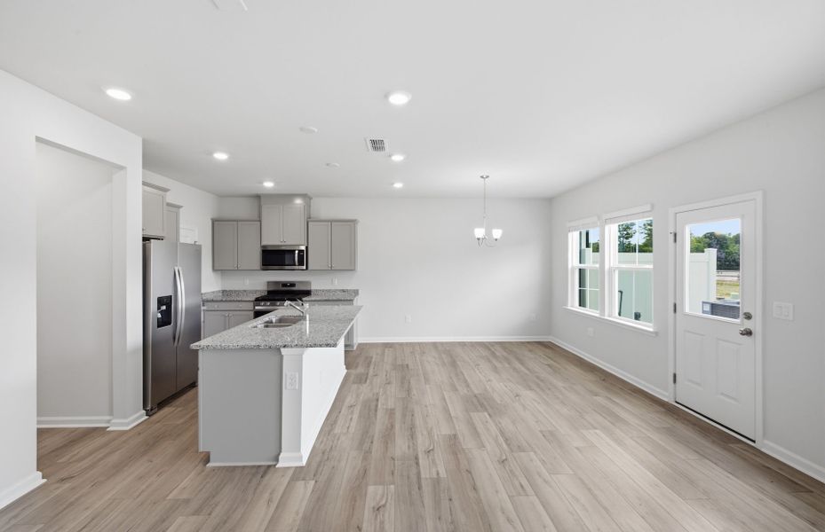 Furnished interior view inside a new home in Saunders Farm, Willow Spring (Image 9).