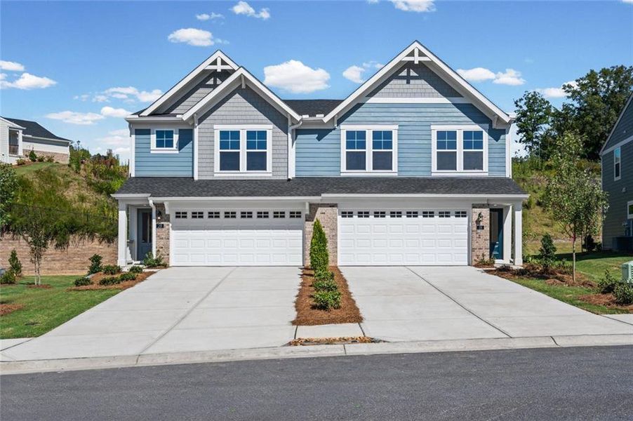 Front exterior of a new home in Villas at Gold Creek, Dawsonville, GA, highlighting curb appeal (Image 19). Front exterior of a new home in Villas at Gold Creek, Dawsonville, GA, highlighting curb appeal (Image 19).