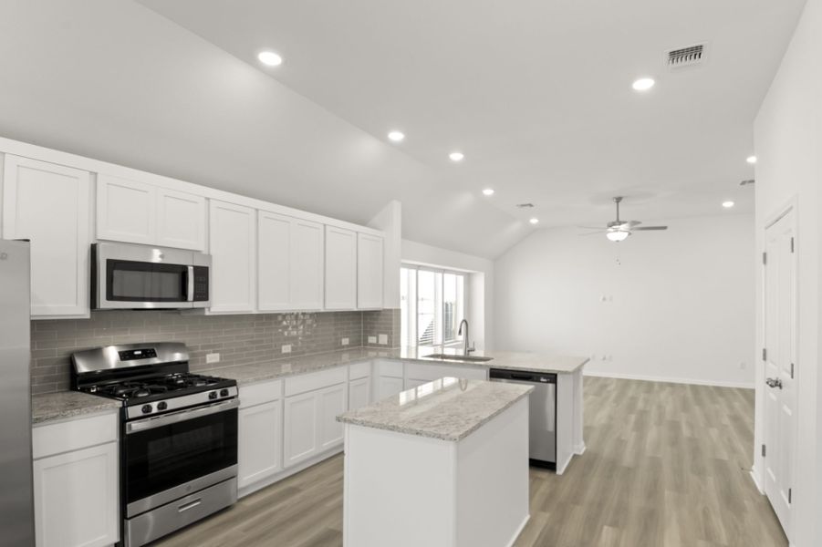 Furnished interior view inside a new home in Crosswinds, Kyle (Image 6).