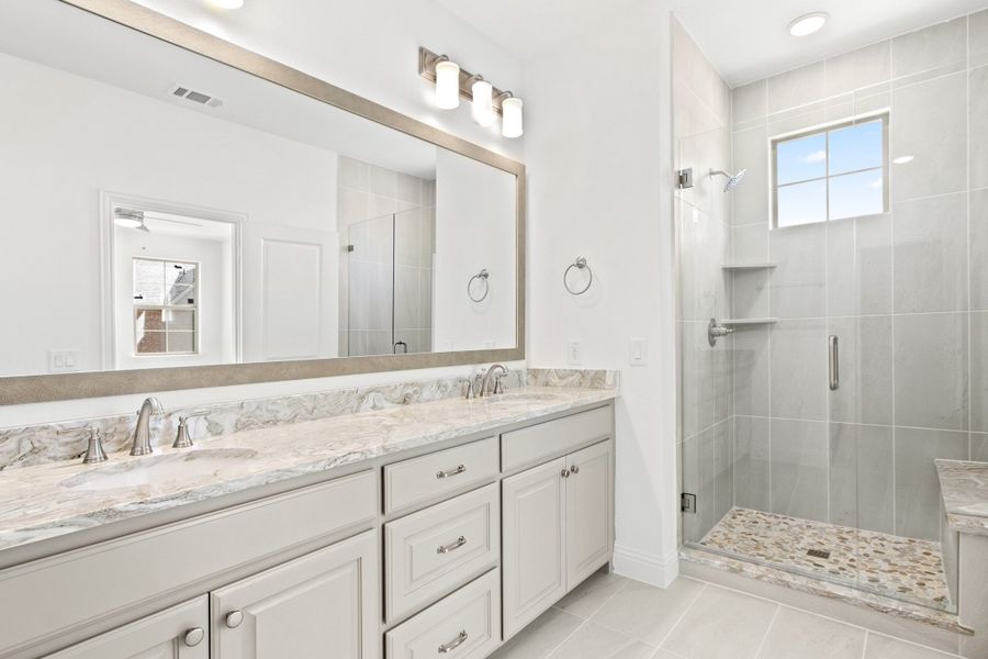 Furnished interior view inside a new home in The Tribute, The Colony (Image 14).