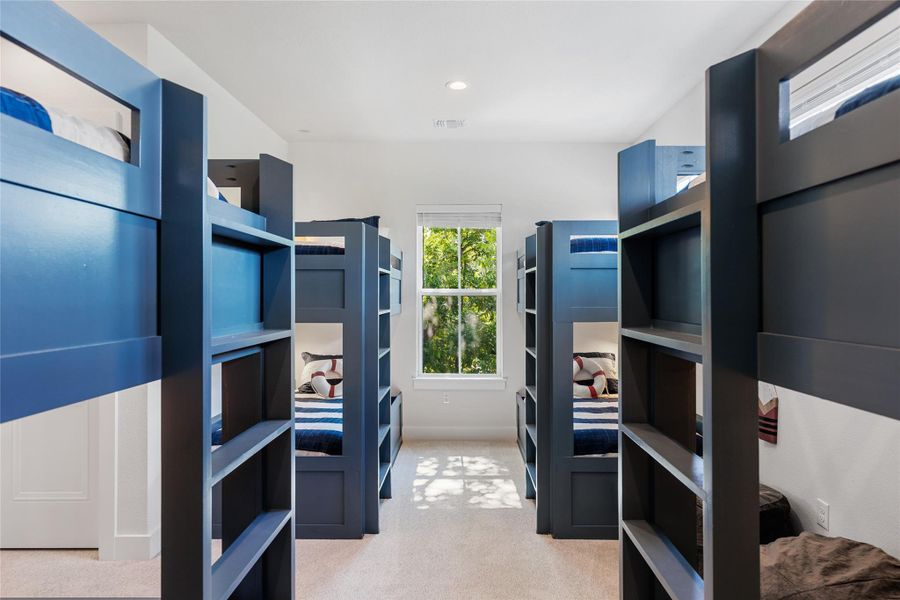 Bedroom 5 has 4 Twin Bunk Beds (Sleeps 8) | En-suite Bathroom | Walk-in Closet | 65" Samsung Smart TV Bedroom 5 has 4 Twin Bunk Beds (Sleeps 8) | En-suite Bathroom | Walk-in Closet | 65" Samsung Smart TV