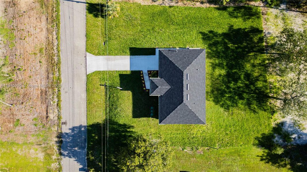 Front exterior of a new home in , Lehigh Acres, FL, highlighting curb appeal (Image 17). Front exterior of a new home in , Lehigh Acres, FL, highlighting curb appeal (Image 17).