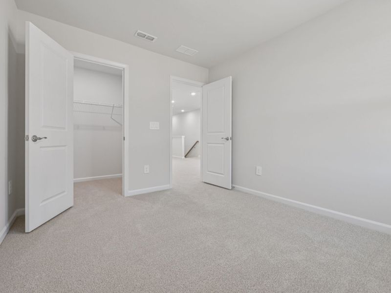 Spacious, unfurnished interior of a new home in The Rows at Buffaloe Reserve, Raleigh (Image 15).