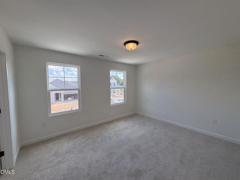 Spacious, unfurnished interior of a new home in Woodland Crossing, Zebulon (Image 36).