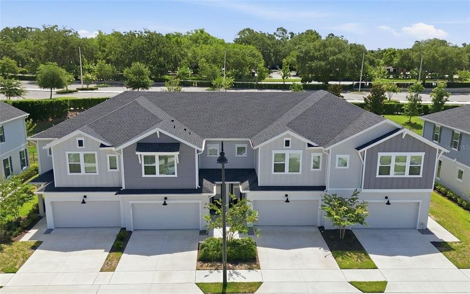 Front exterior of a new home in , Lake Mary, FL, highlighting curb appeal (Image 25). Front exterior of a new home in , Lake Mary, FL, highlighting curb appeal (Image 25).