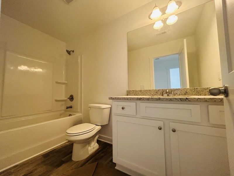 Furnished interior view inside a new home in Sutton's Landing, Statham (Image 6).