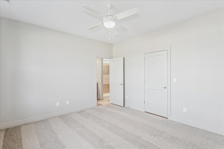 Spacious, unfurnished interior of a new home in The Courtyards at Jacobs Farm, Wichita (Image 19).