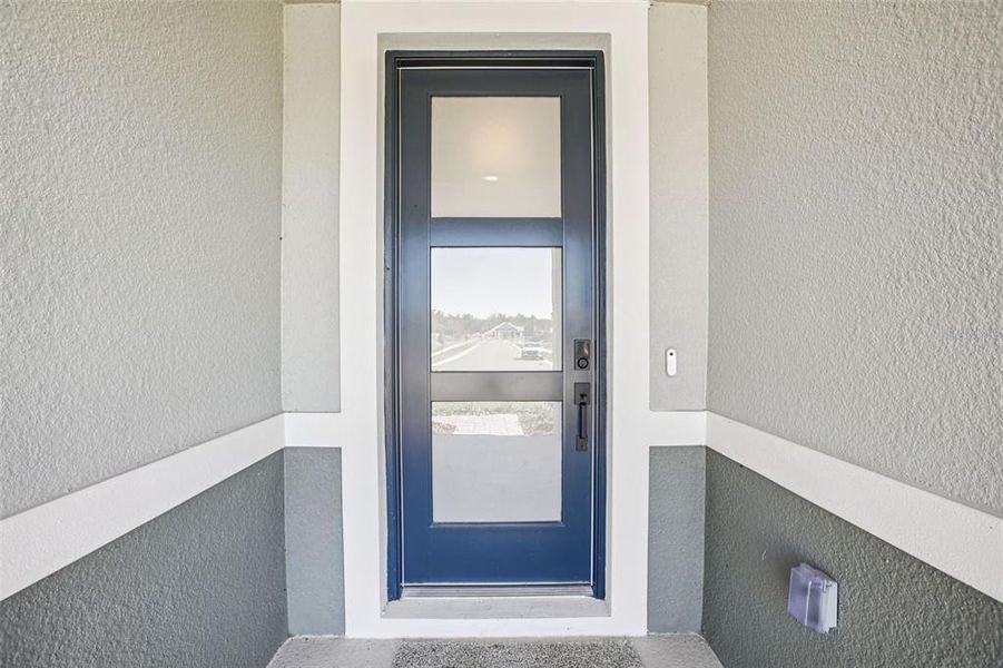 Exterior details and patio area of a home in Two Rivers - Signature Series, Zephyrhills (Image 3).
