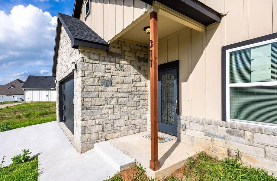 Exterior details and patio area of a home in , Woodway (Image 3).