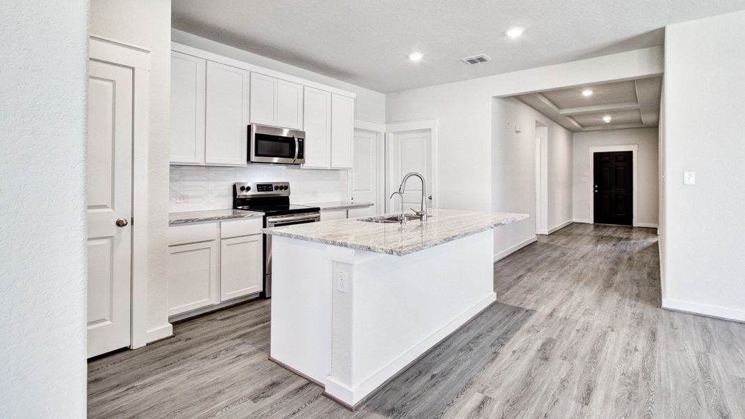 Representative furnished interior of a home built from the Paramount by Brightland Homes in Mostyn Springs, Magnolia (Image 5).