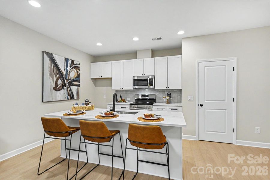 Furnished interior view inside a new home in , Monroe (Image 12).