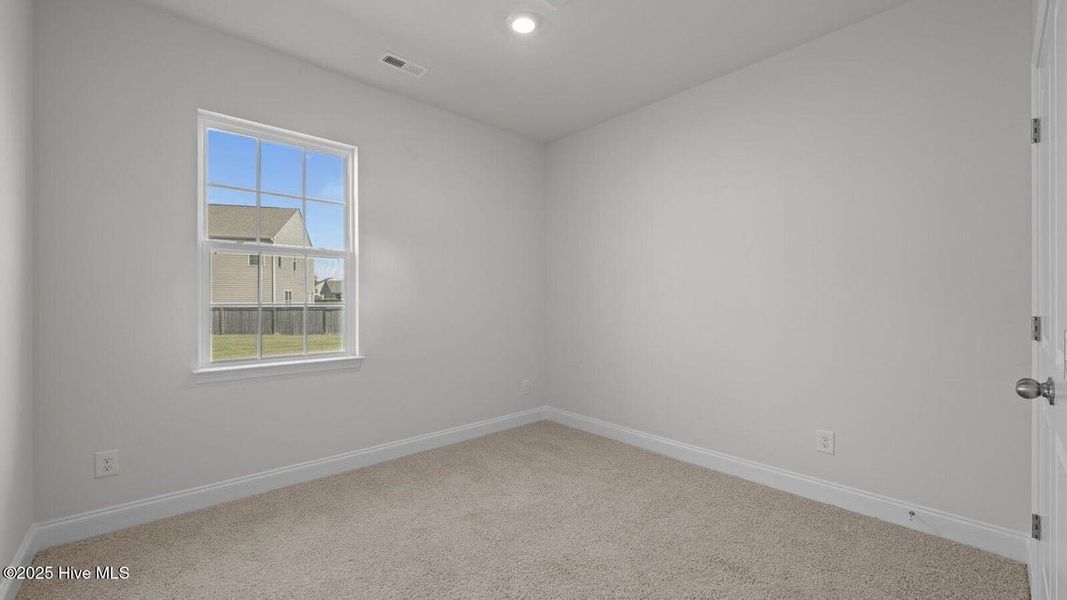 Spacious, unfurnished interior of a new home in Tyler - Home on the Lake, New Bern (Image 18).
