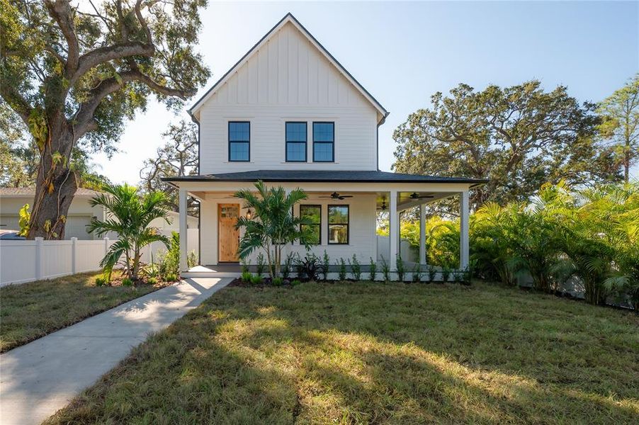Front exterior of a new home in , Tampa, FL, highlighting curb appeal (Image 30).