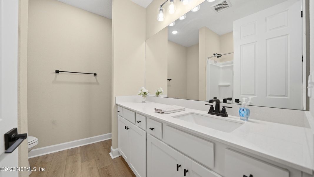 Furnished interior view inside a new home in Tributary, Yulee (Image 32).