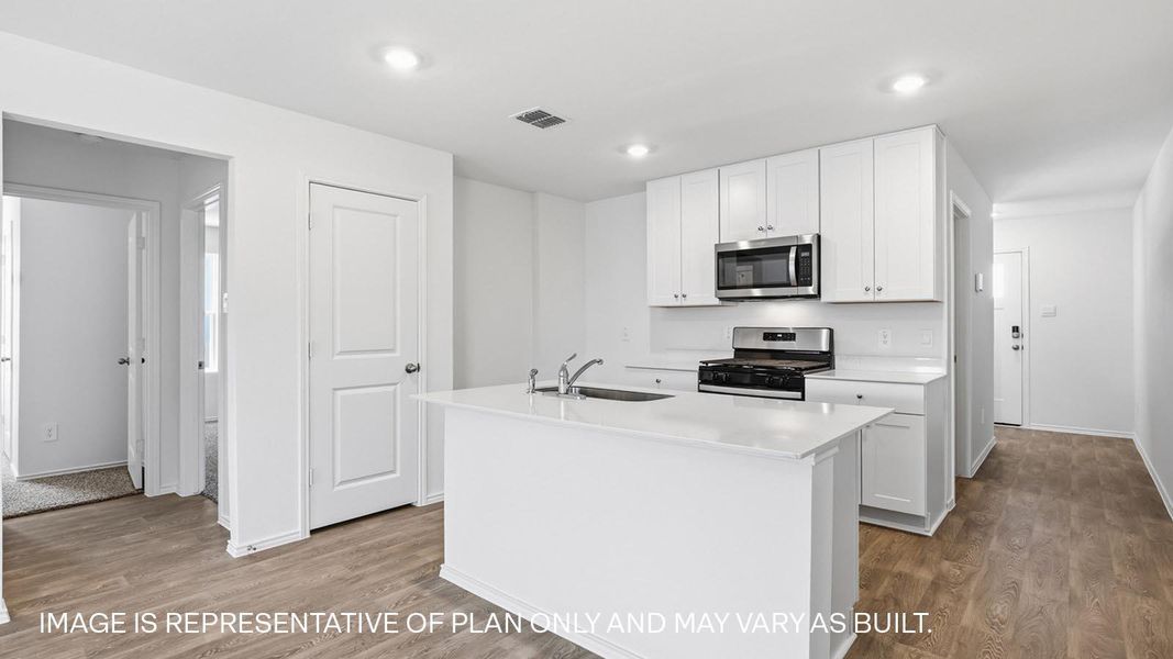 Furnished interior view inside a new home in Watermill, Uhland (Image 3).