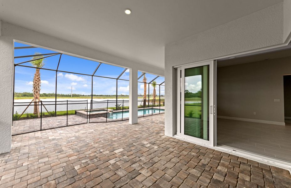 Exterior details and patio area of a home in Del Webb Oak Creek, North Fort Myers (Image 24).