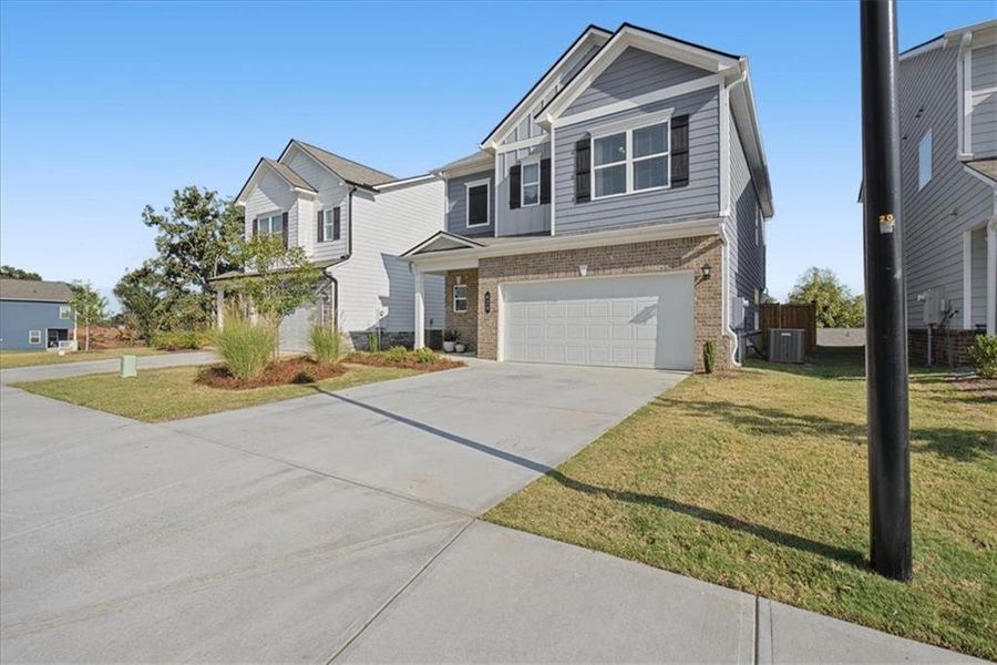 Front exterior of a new home in , Cartersville, GA, highlighting curb appeal (Image 28).