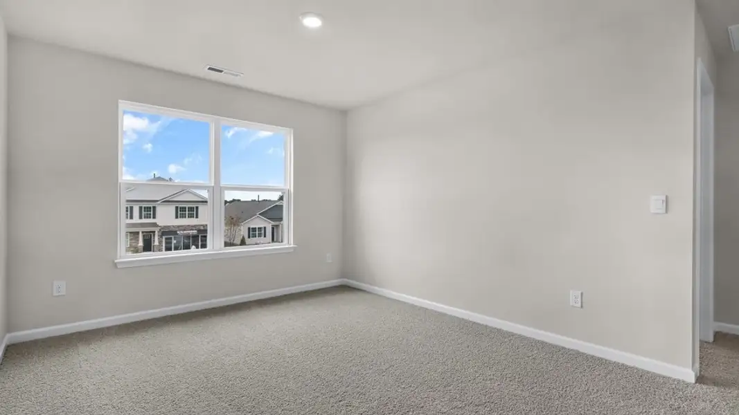 Spacious, unfurnished interior of a new home in The Reserve at Prestleigh, Wake Forest (Image 23).