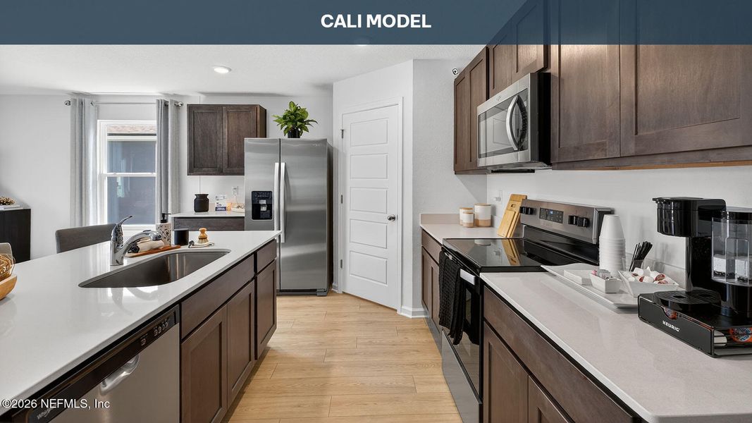 Furnished interior view inside a new home in Rookery, Green Cove Springs (Image 7). Furnished interior view inside a new home in Rookery, Green Cove Springs (Image 7).