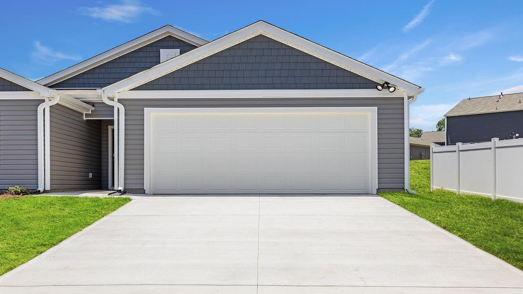 Front exterior of a new home in Treemont Commons, Wellford, SC, highlighting curb appeal (Image 20).