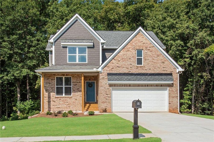 Front exterior of a new home in , Ellenwood, GA, highlighting curb appeal (Image 2). Front exterior of a new home in , Ellenwood, GA, highlighting curb appeal (Image 2).