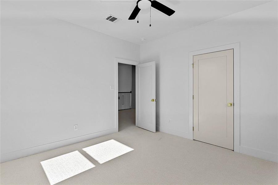 4th Bedroom on the 2nd floor with carpet and a ceiling fan 4th Bedroom on the 2nd floor with carpet and a ceiling fan