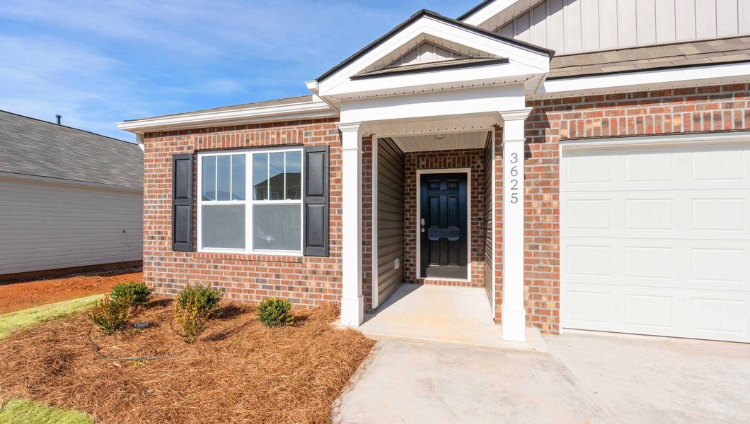 Exterior details and patio area of a home in Gibson Grove, Laurens (Image 2).