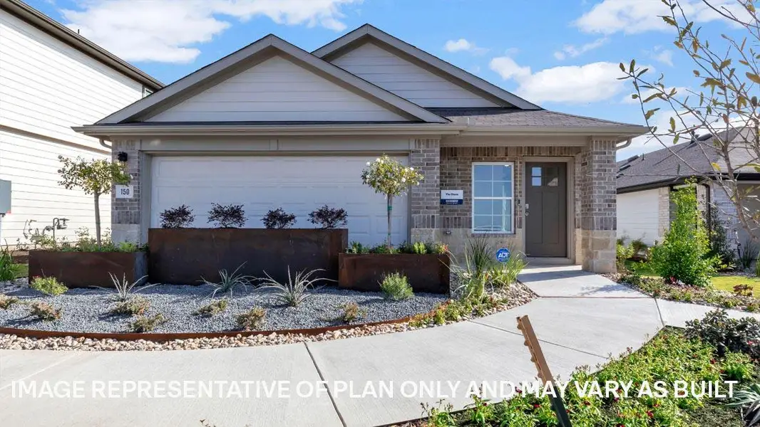 Front exterior of a new home in Prairie Lakes, Buda, TX, highlighting curb appeal (Image 2). Front exterior of a new home in Prairie Lakes, Buda, TX, highlighting curb appeal (Image 2).