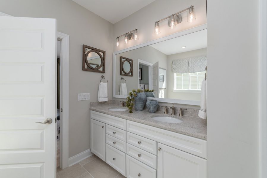Owner's spa bath with dual sinks