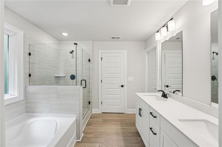 Furnished interior view inside a new home in Hemingway - Reserve Series, Cumming (Image 16). Furnished interior view inside a new home in Hemingway - Reserve Series, Cumming (Image 16).