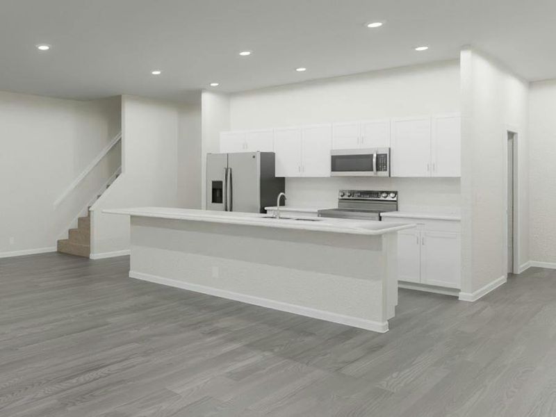 Enjoy a spacious, open living area and kitchen with beautiful finishes. (Artist`s rendering)