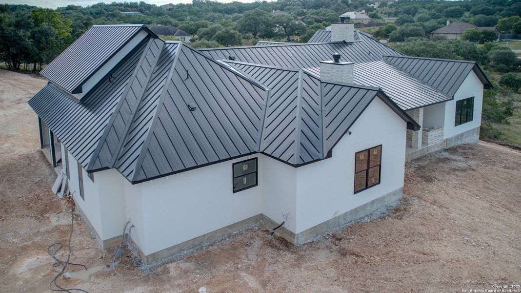 Front exterior of a new home in , New Braunfels, TX, highlighting curb appeal (Image 19). Front exterior of a new home in , New Braunfels, TX, highlighting curb appeal (Image 19).