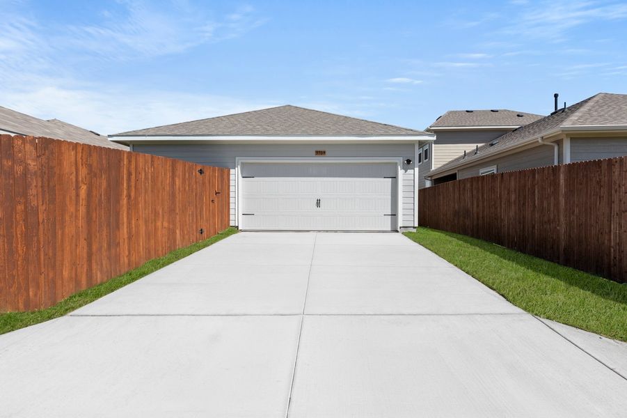 Front exterior of a new home in Heartland, Crandall, TX, highlighting curb appeal (Image 27).