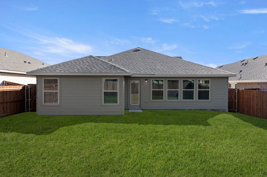Front exterior of a new home in De Berry Reserve, Royse City, TX, highlighting curb appeal (Image 26).