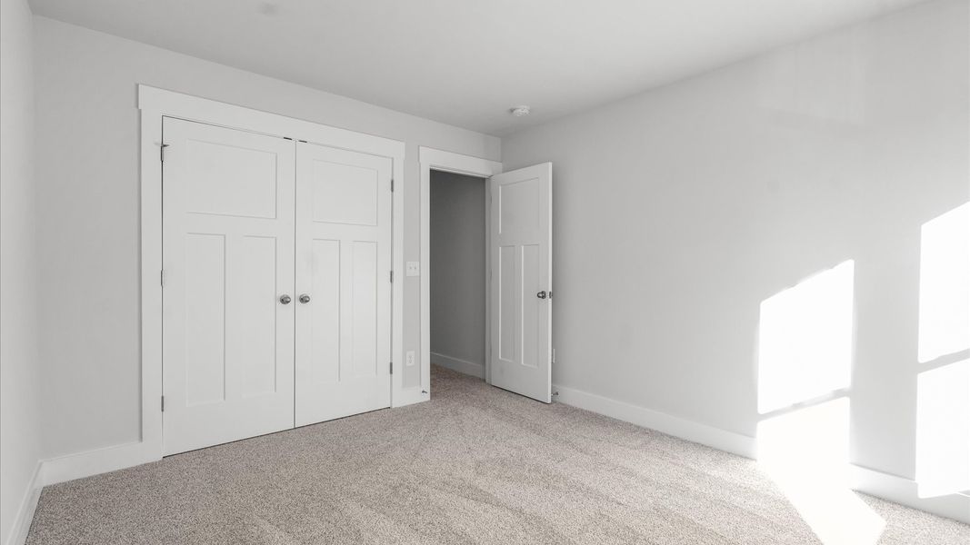 Furnished interior view inside a new home in Camden Cottages, Greenville (Image 32).