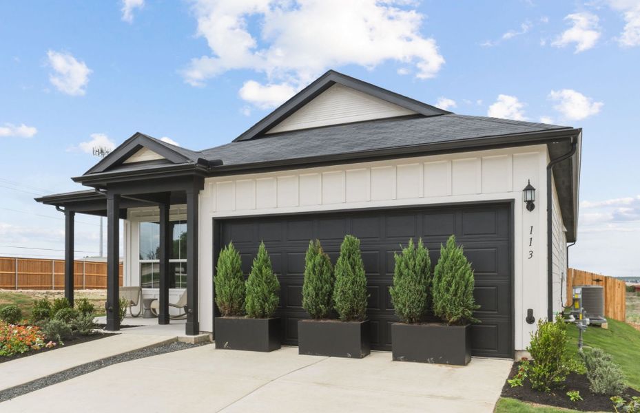 Representative exterior photo of a completed home built from the Hewitt by Centex in Vantage, San Marcos, TX (Image 26).
