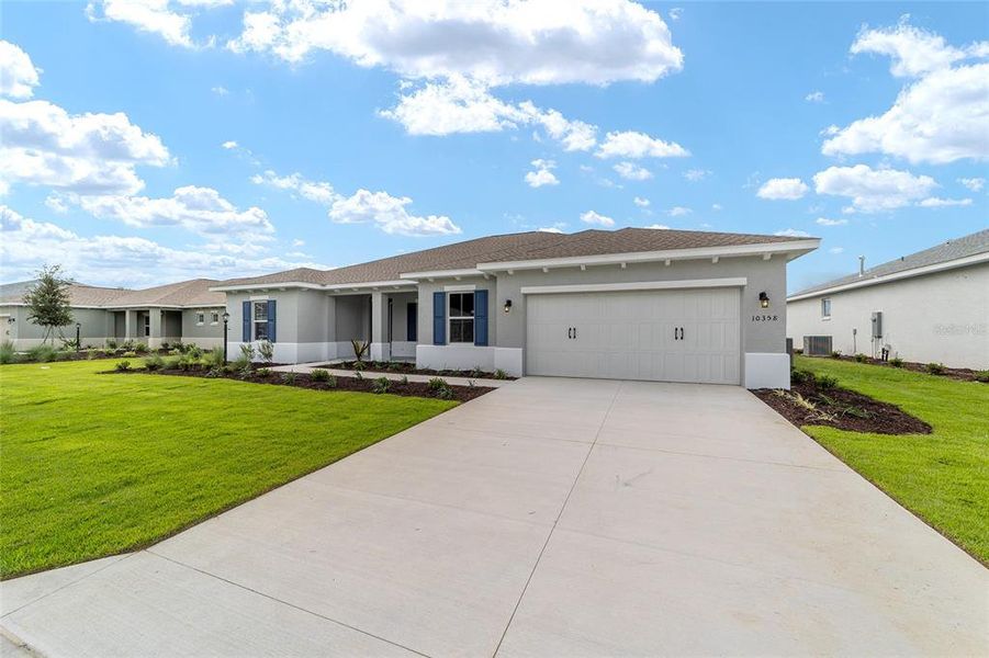 Exterior details and patio area of a home in On Top of the World Communities, Ocala (Image 4).