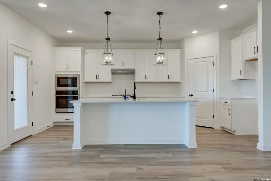 Furnished interior view inside a new home in Nopal Valley, San Antonio (Image 12).