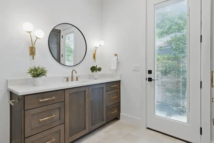Bathroom with vanity and plenty of natural light