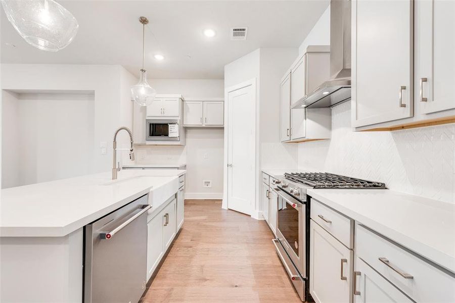Furnished interior view inside a new home in Collin Creek, Plano (Image 7).