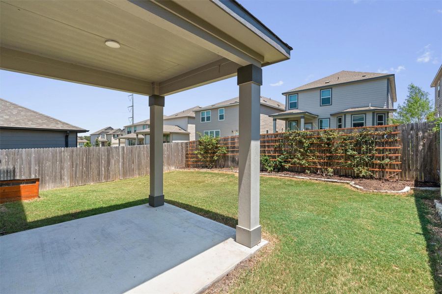 Exterior details and patio area of a home in , Manor (Image 4).