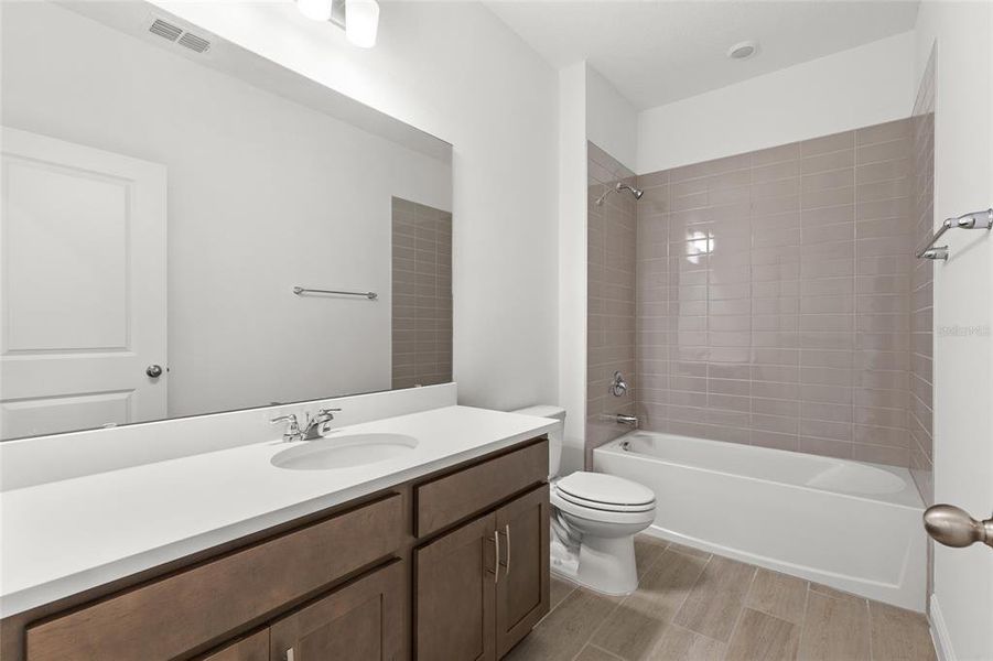 Furnished interior view inside a new home in Crossroads at Kelly Park, Apopka (Image 15).