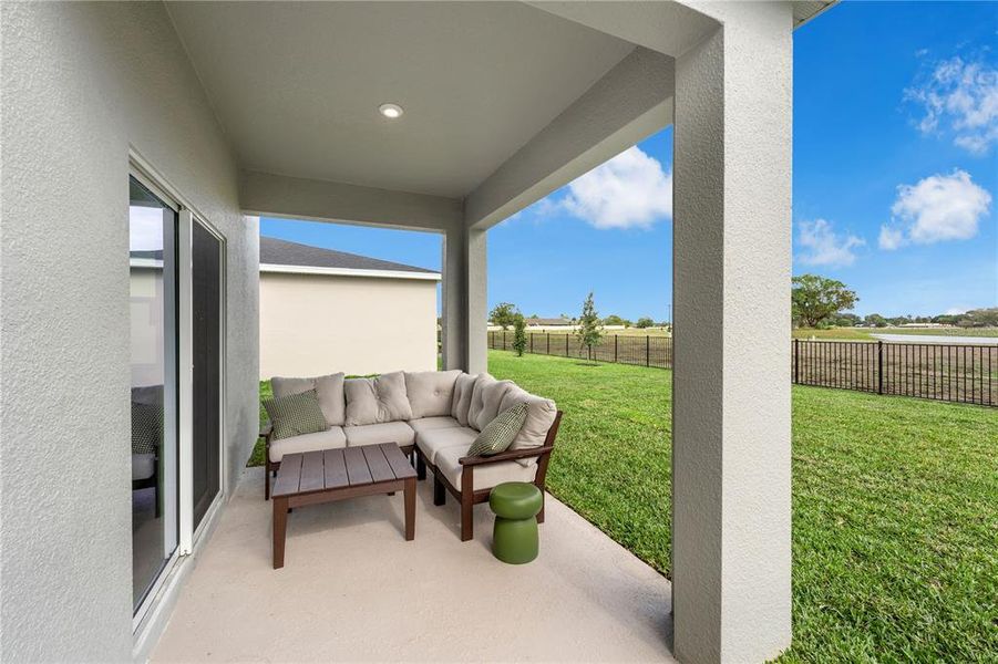 Exterior details and patio area of a home in Oakfield Trails, Parrish (Image 29). Exterior details and patio area of a home in Oakfield Trails, Parrish (Image 29).